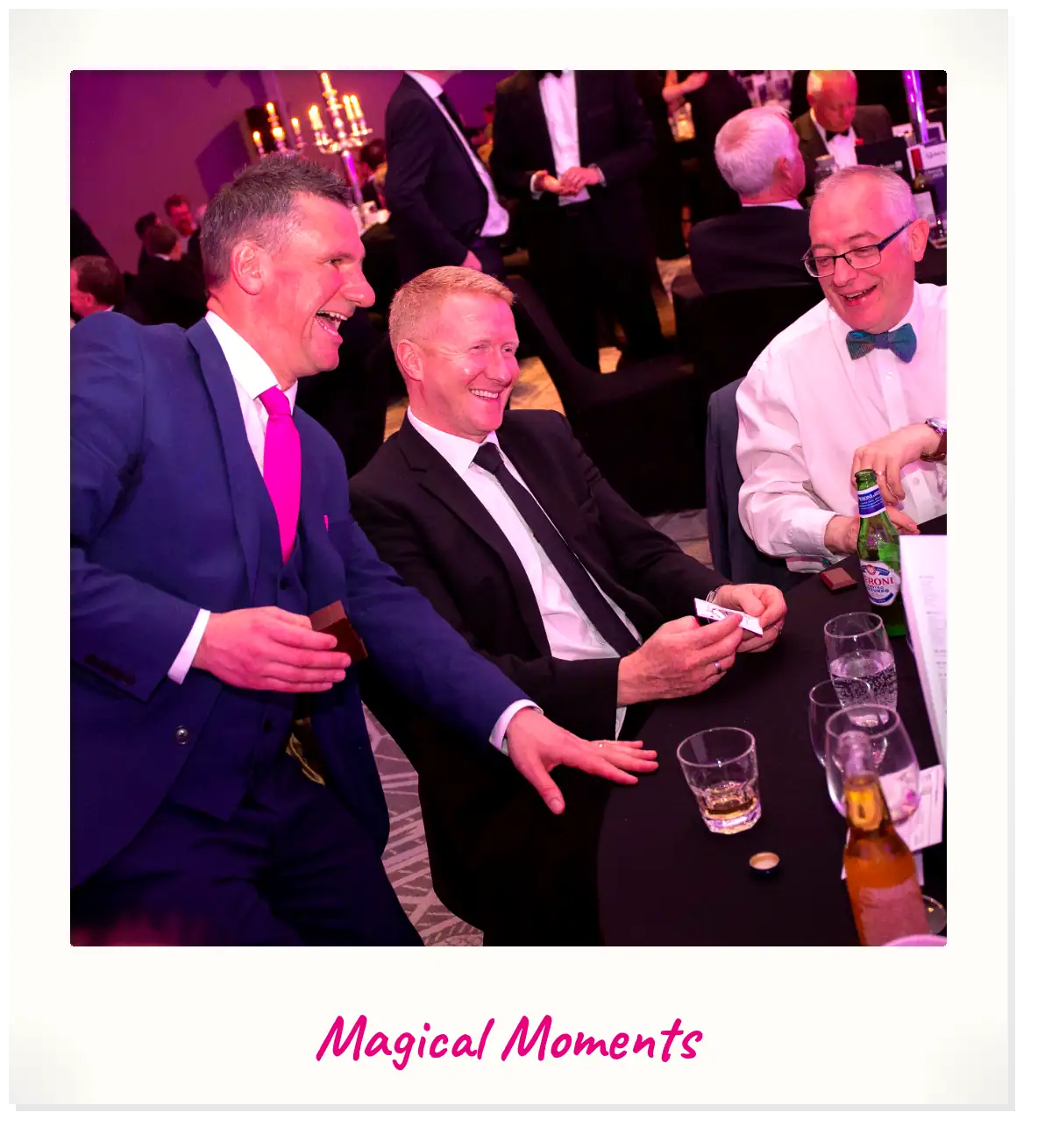 Comedy magician performing close-up magic at an event in Inverness