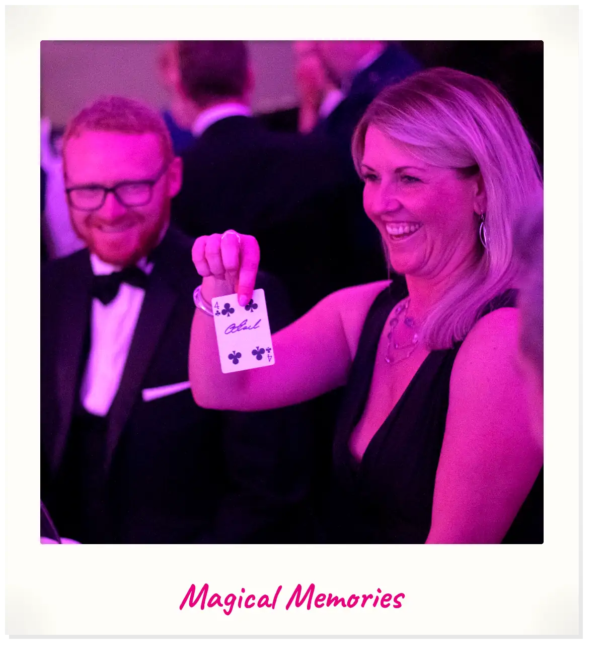 Corporate magician in Inverness. Jody Greig performing close-up magic at a Highland event