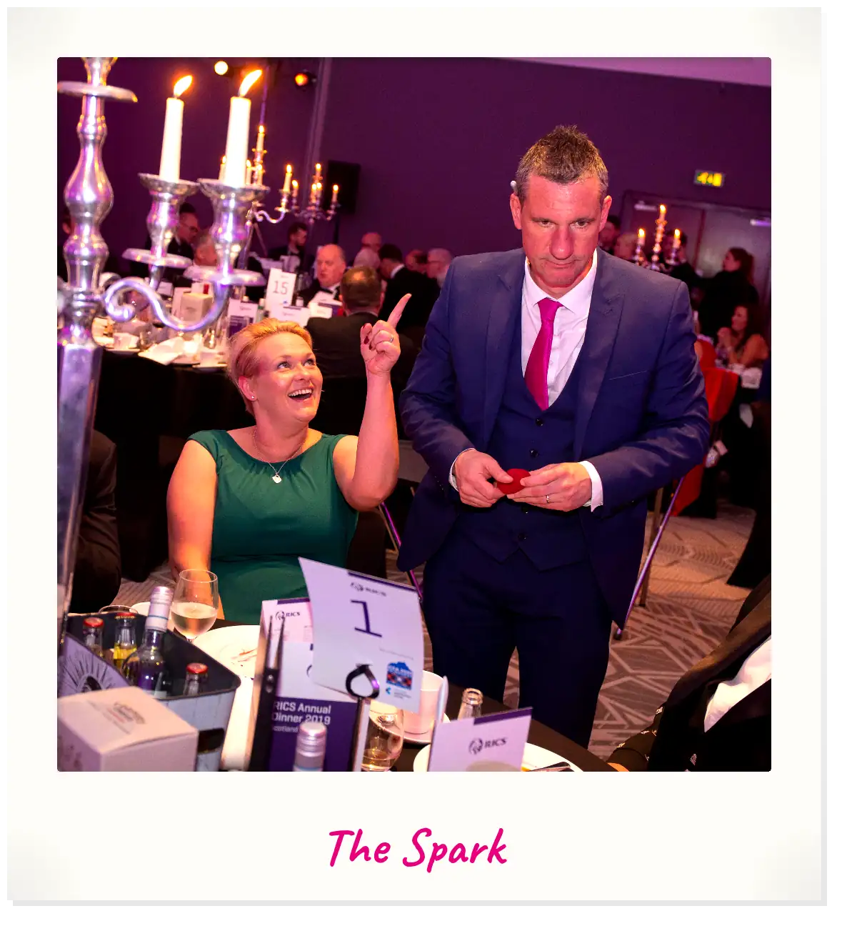 Hire a party magician in Perth. Jody Greig performing close-up card magic to delighted guests
