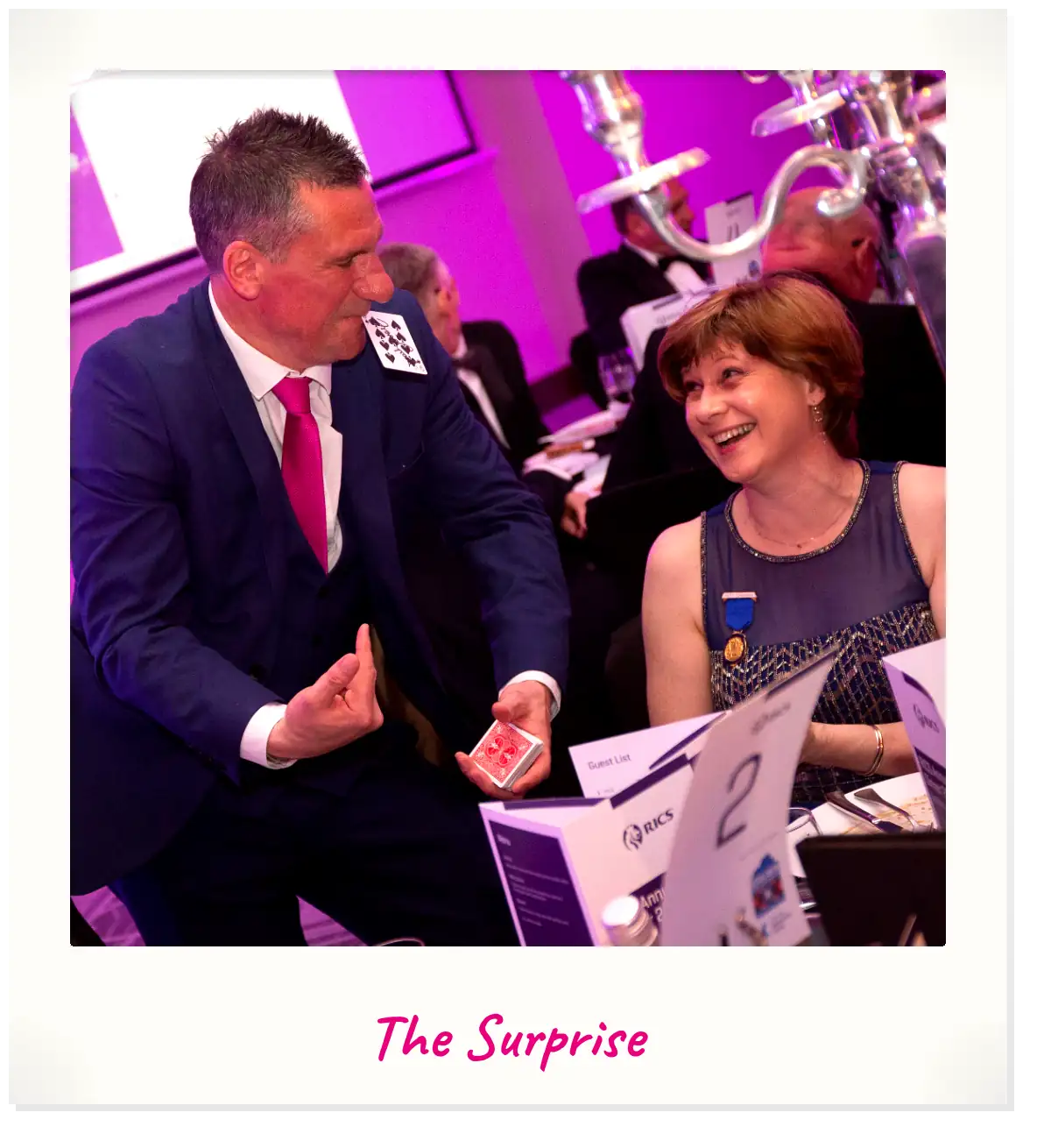 Magician for hire in Stirling. Jody Greig performing close-up magic at a Stirling event